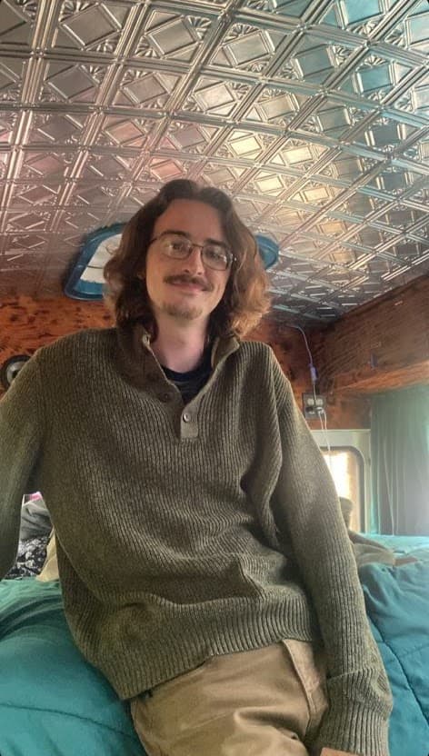 Me in a hippie bus during a trip to Belfair, Washington
